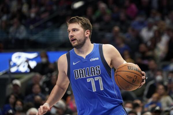 Doncic gets triple double despite fouls Mavericks top Hawks AP News